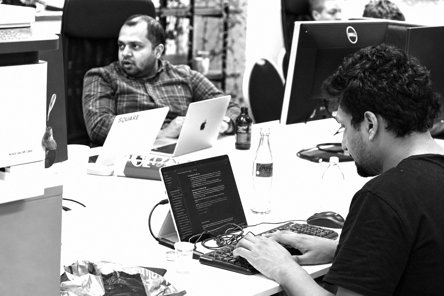 Participants working on their laptops at the Berlin Finance Hackathon