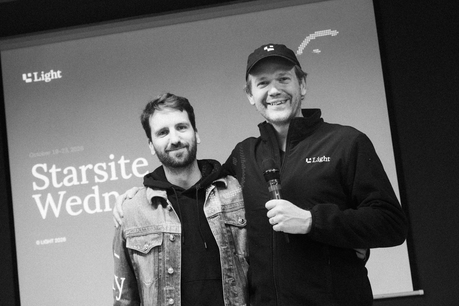 Light's founders, Jonathan Sanders and Filip Kozjak, on stage in front of the Starsite X Wednesday slide