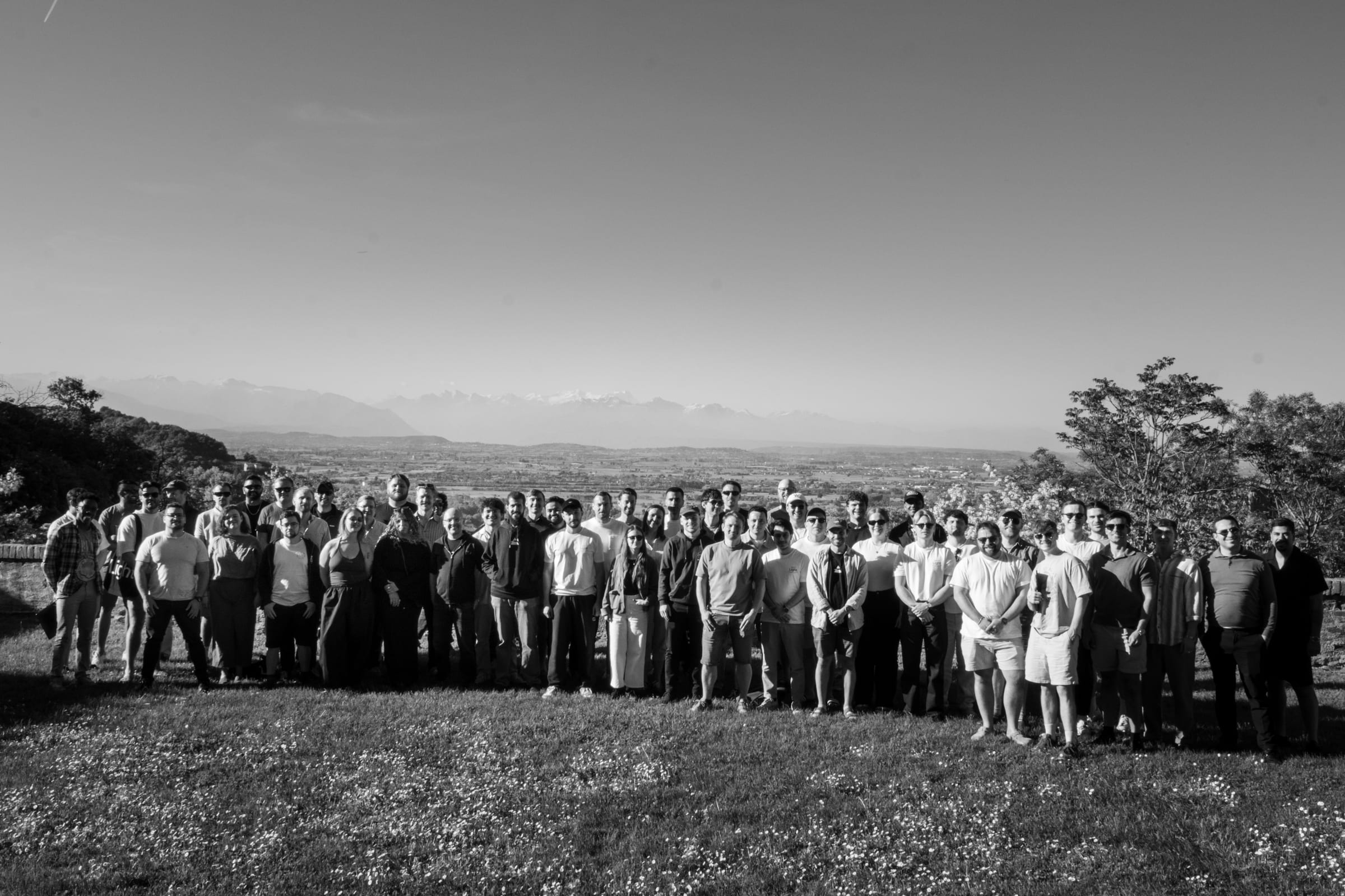 The Light team standing together on a hillside at Starsite