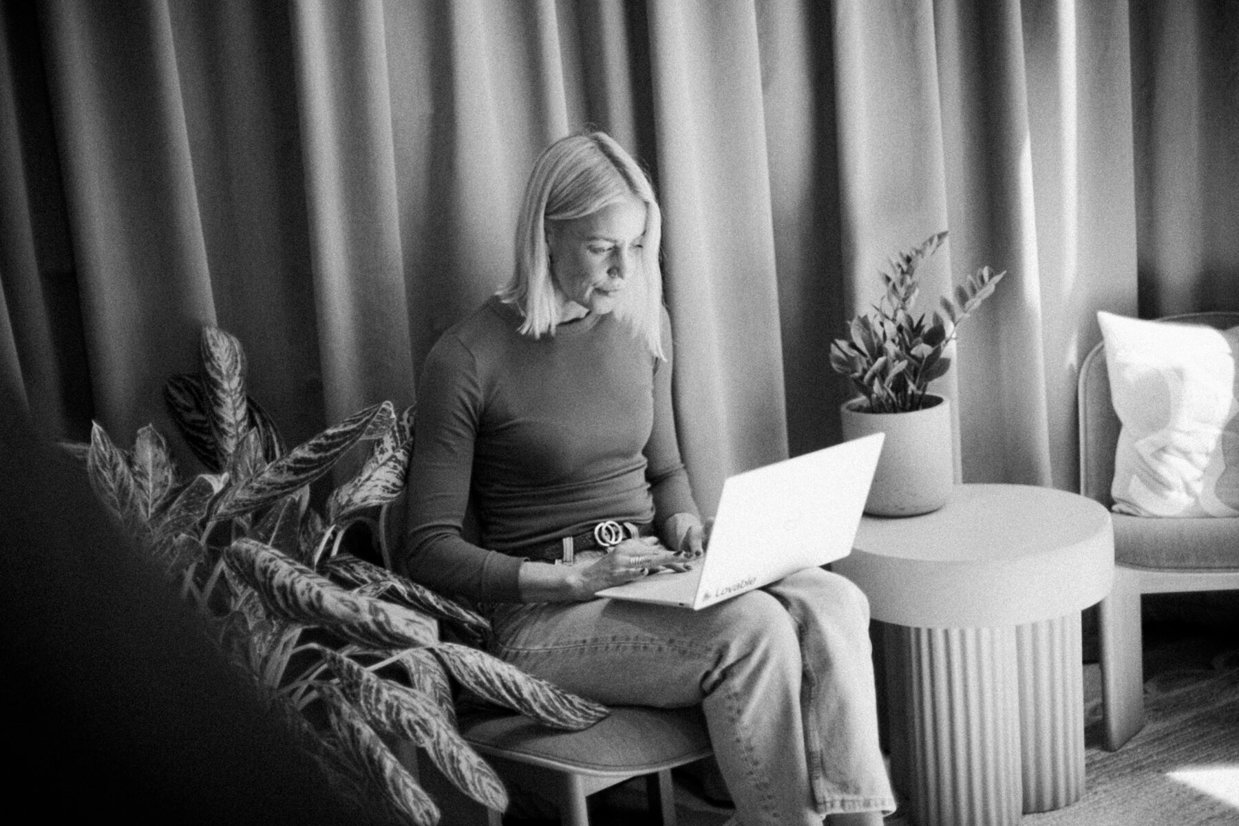 Working through finance reporting on a laptop